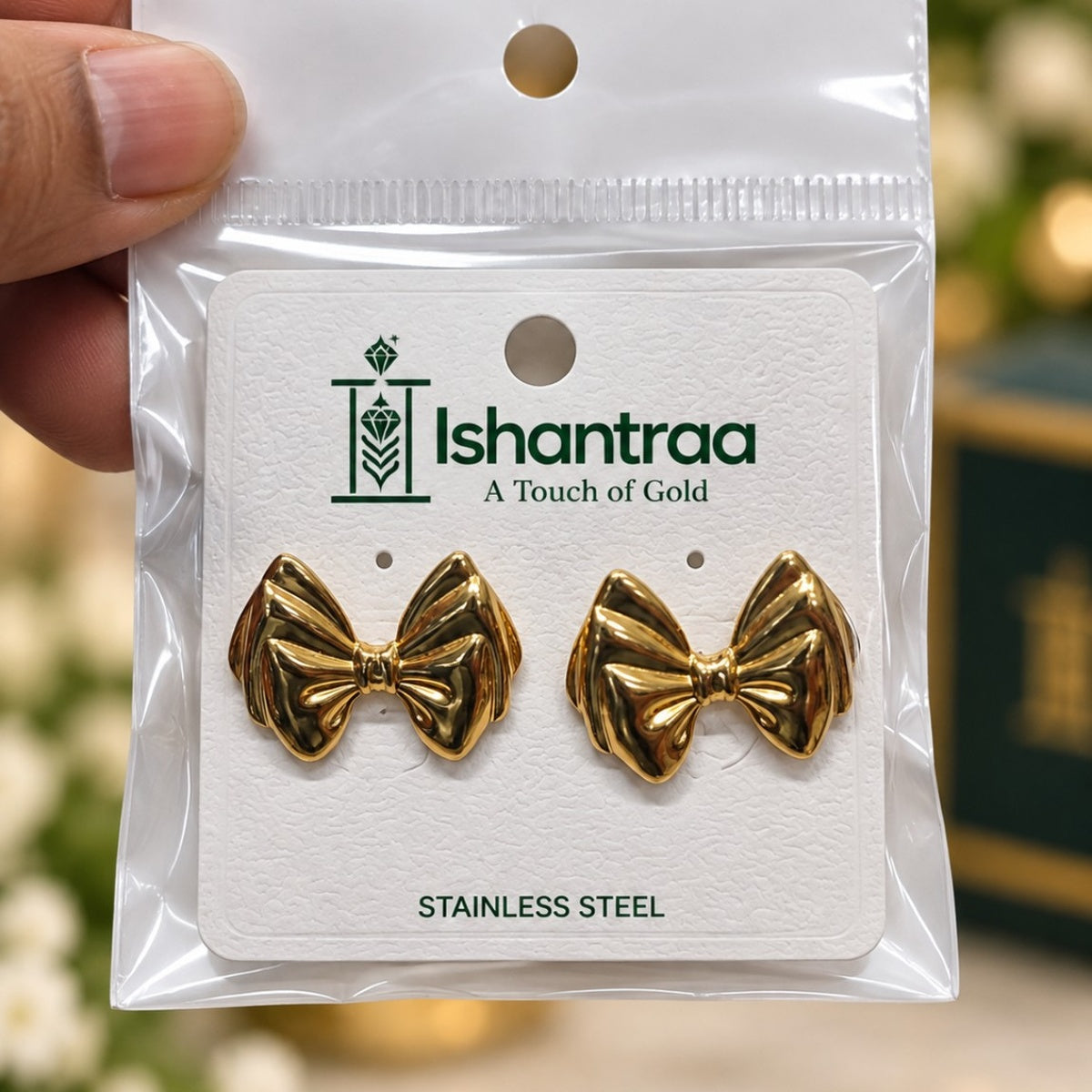 ISHANTRAA Gold Touch Bow Stud Stainless Steel Earrings - product photo 1