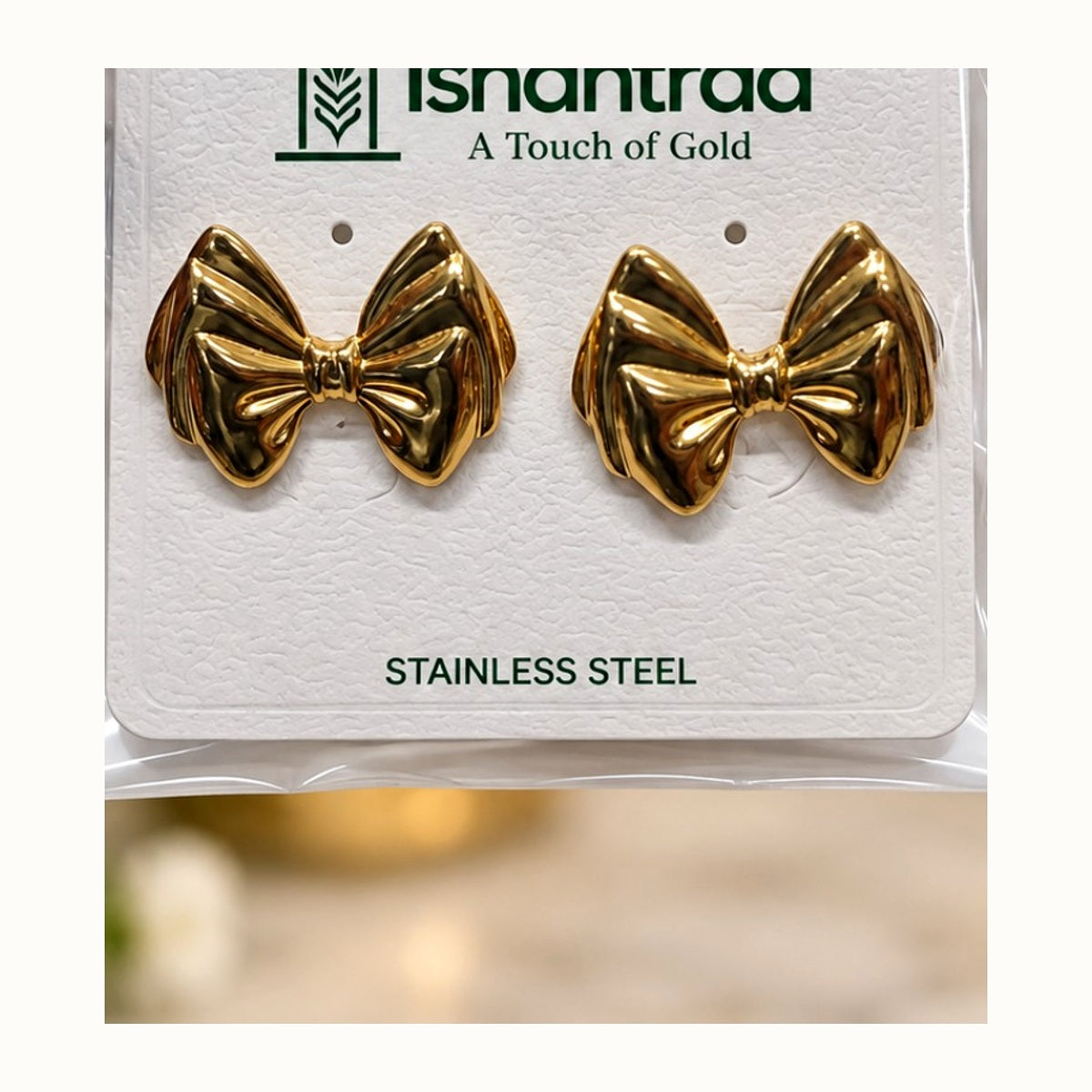 ISHANTRAA Gold Touch Bow Stud Stainless Steel Earrings - close-up