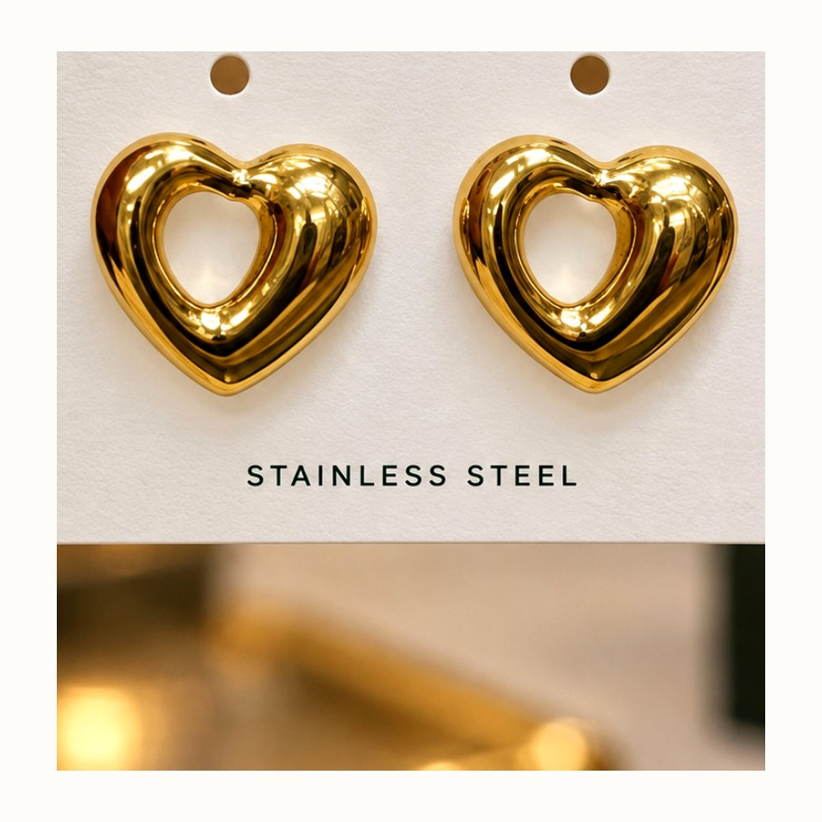 ISHANTRAA Gold Touch Heart Stainless Steel Earrings - close-up