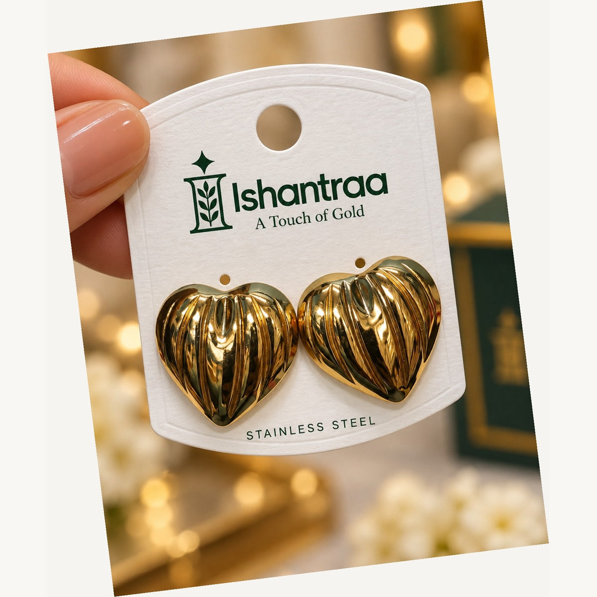 ISHANTRAA Gold Touch Heart Statement Stainless Steel Earrings - angled view
