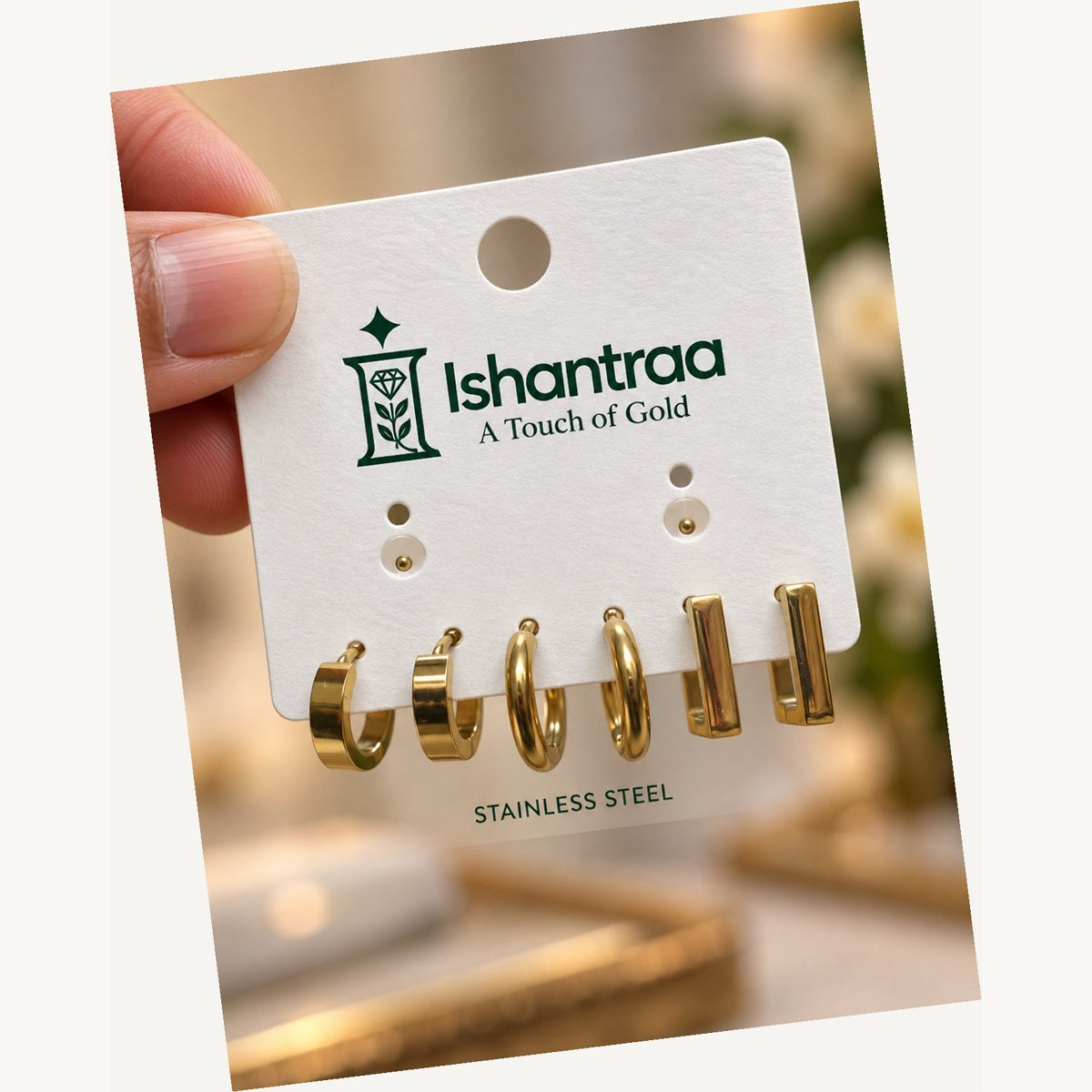 ISHANTRAA Gold Touch Twisted Hoop Stainless Steel Earrings - angled view