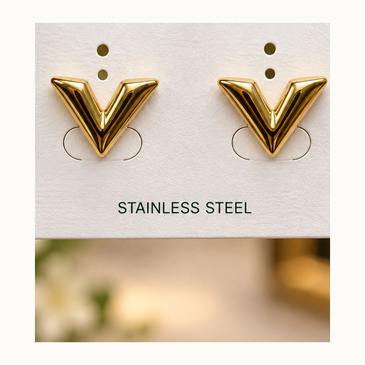 ISHANTRAA Gold Touch V Statement Stainless Steel Earrings - close-up