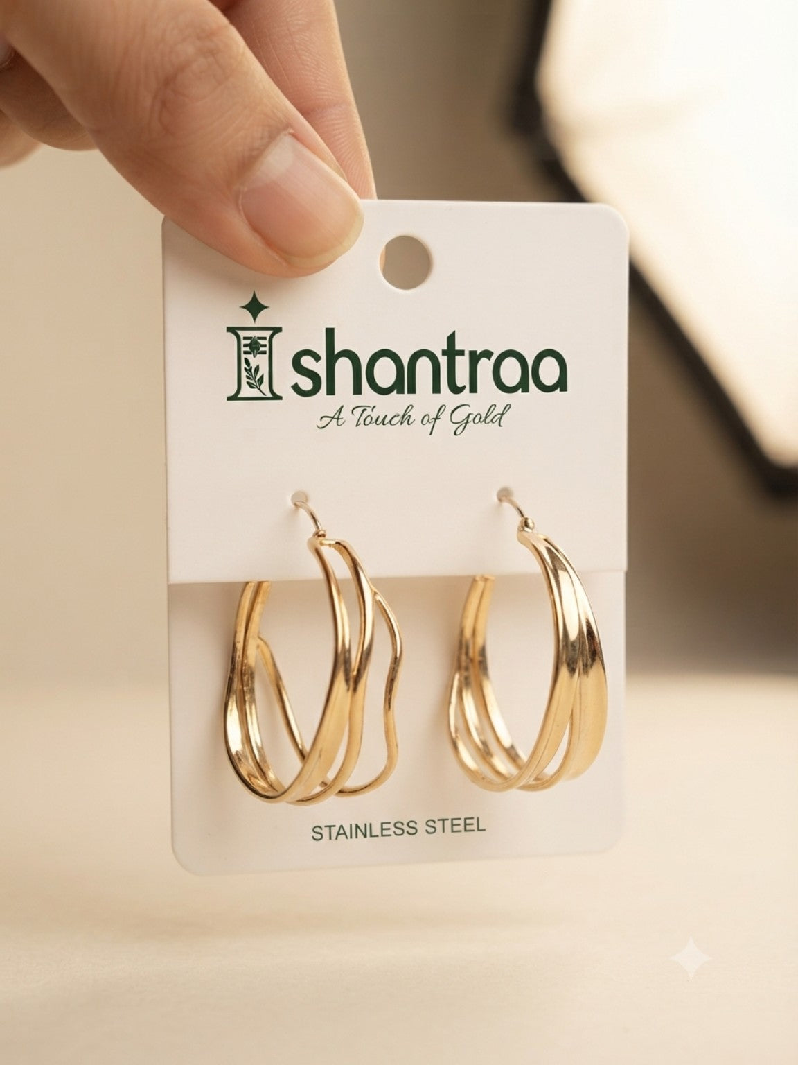 ISHANTRAA Gold Touch Twisted Hoop Stainless Steel Earrings