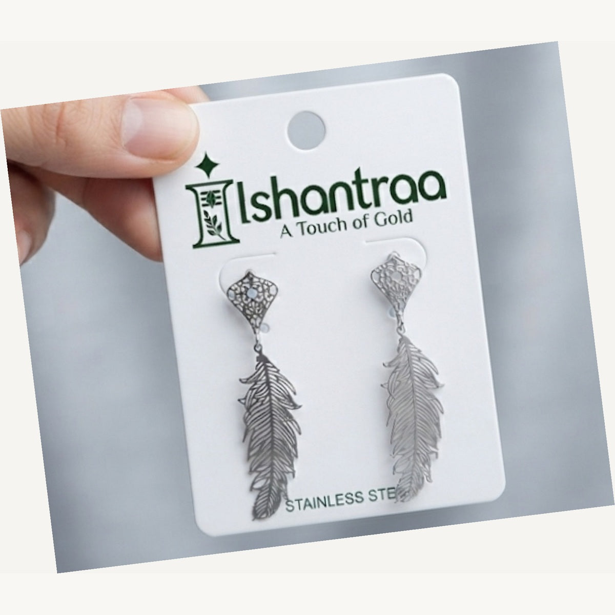 ISHANTRAA Silver Touch Feather Drop Stainless Steel Earrings - angled view