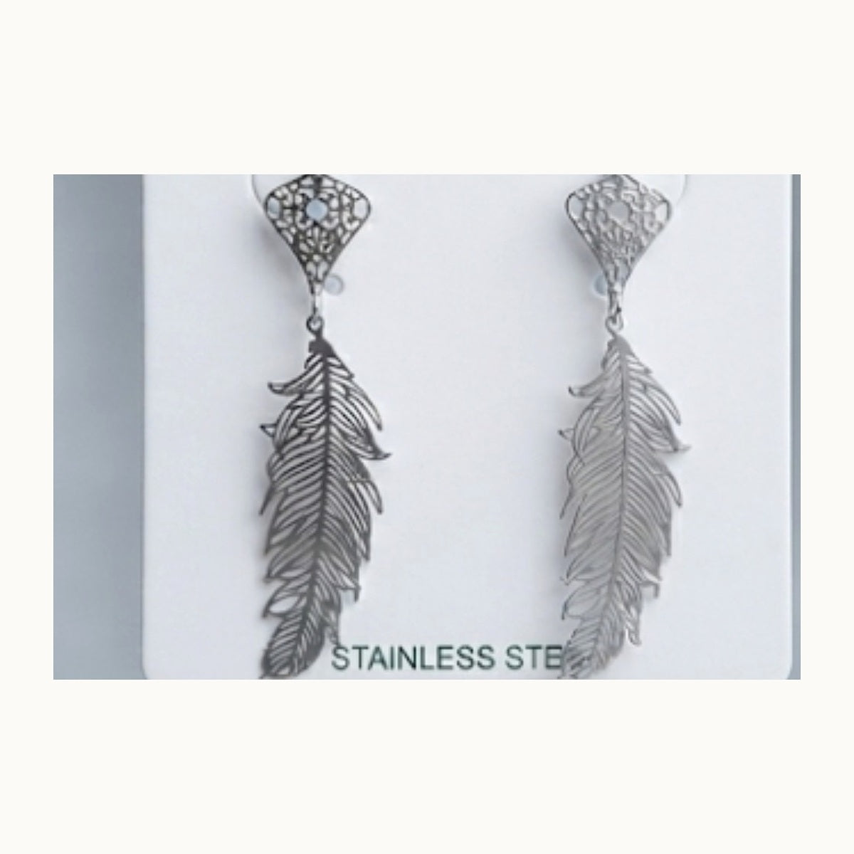 ISHANTRAA Silver Touch Feather Drop Stainless Steel Earrings - close-up
